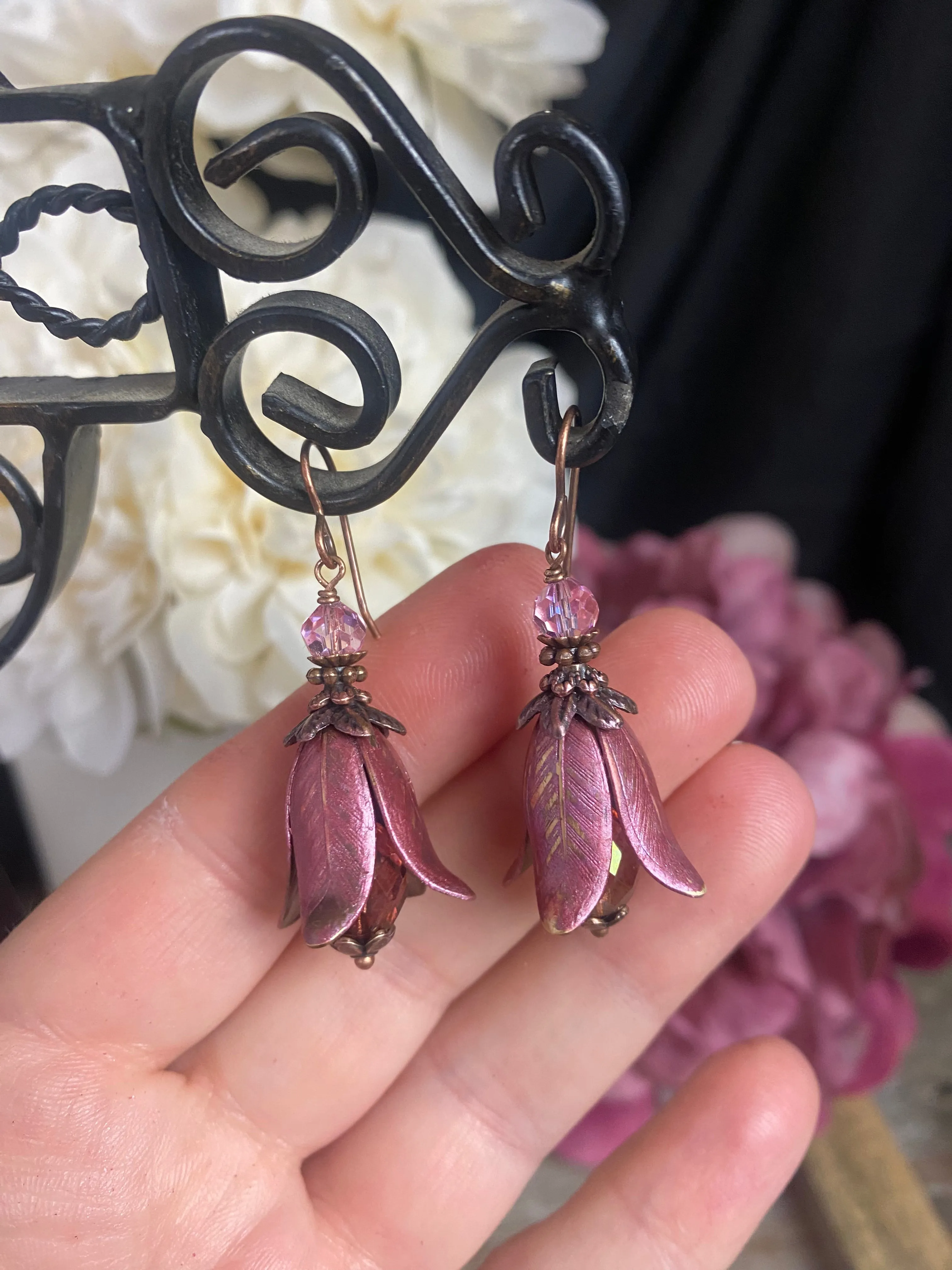 Rose pink polish glass, Vintaj flower bead caps, pink crystal, and copper metal earrings.